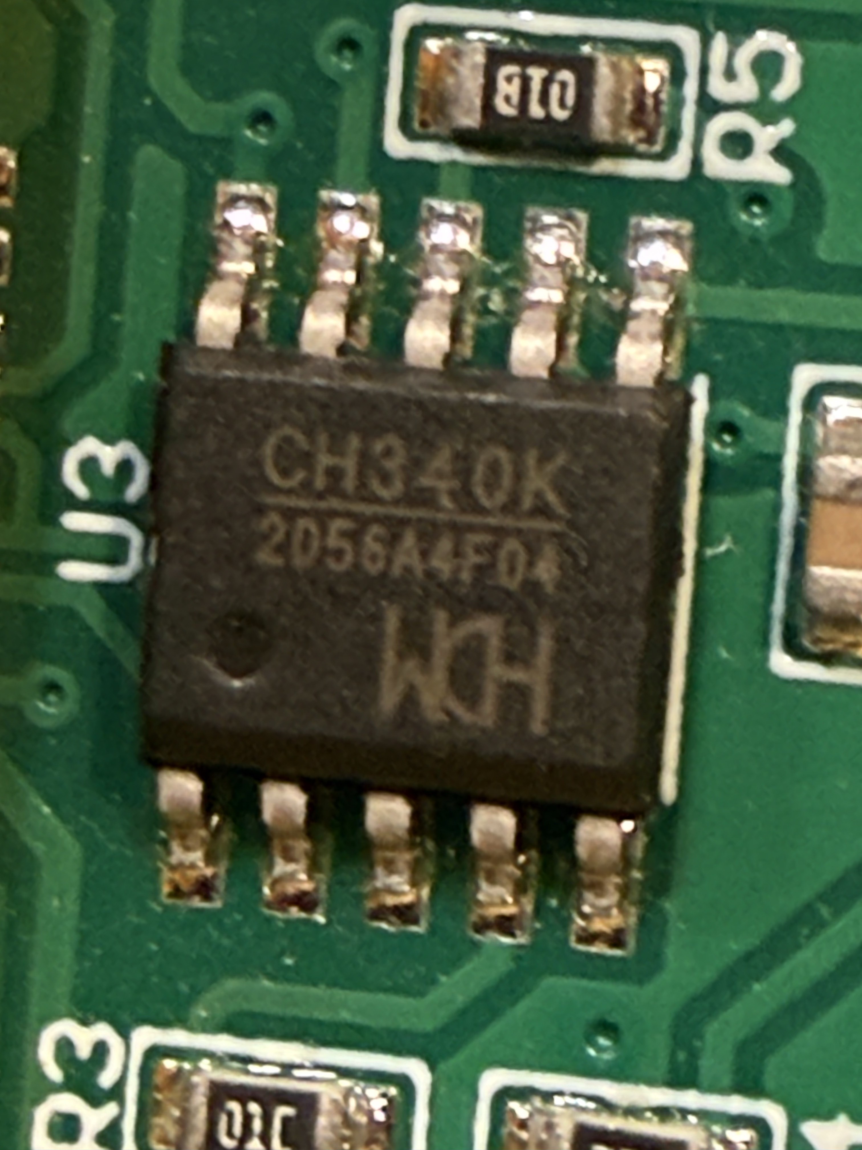 Close-up of the CH340K USB-to-serial converter IC by WCH